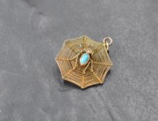 A 9ct gold turquoise and seed pearl set spider and web pendant, marked 9ct to suspension, 2cm, 1.