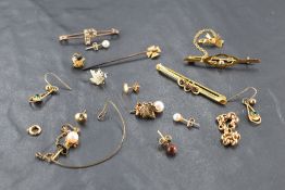 A selection of yellow metal jewellery including earrings, bar brooches, stick pin etc, gross