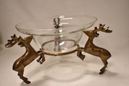 Two table centre piece bowls having metal stands with stag decoration.