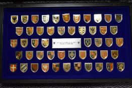 A 20th century cased set of collectors Coats of Arms from great Monarchs