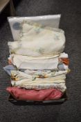A box of vintage and modern table line, a vintage baby gown and pram or cot set and a 1930s bed