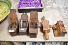 A selection of antique woodwork or carpenters planes including Robert Sorby boat and block planes