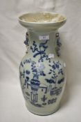A 19th century Chinese cealadon vase having symbolic pictorial decorations of flowers, vases, tables