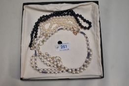 A small selection of modern cultured pearl jewellery including black pearl, pearl and blue agate