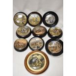 A collection of Pratt ware paste pot lids, to include 'The enthusiast', 'The village wedding' and 'I