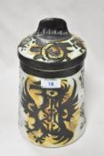 A 1960s lidded Celtic pottery mousehole jar.