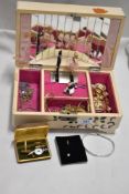 A mid century wooden jewellery box housing a mixed lot of costume jewellery, including chains, stick