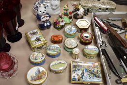 A collection of ceramic trinket boxes and similar, including London, Bath and car interest.