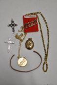 Two HM silver crucifix and two yellow metal chains with yellow metal pendant and locket