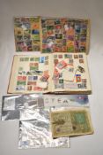 A stamp album and a collection of stamps, of world interest, including Italy, Iraq, Australia and