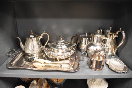 A selection of plated ware, including tray, tea pots, servers and more.