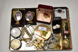 A miscellany of items to include costume jewellery, compact, cuff links, stop watch and similar.