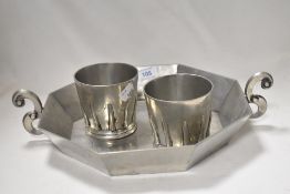 A stylised white metal tray having scroll handles and two tumblers, marked to underside with Pedraza
