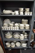 A large collection of Royal Doulton 'Larchmont' dinner service, cups and saucers, tureens, soup