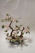 An oriental study of a cherry tree using natural stones and beadwork.