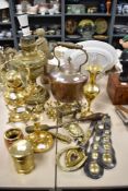 A selection of brass and copper, including copper kettle, nut crackers, candlestick and more.