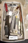 A selection of vintage pocket knives, lighters and similar, including MOP handled and possible