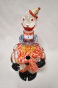 A 1960s Murano glass decanter in the form of a clown.