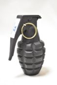 A replica hand grenade.