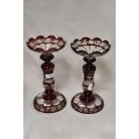 Two Victorian Table lustres having painted red ground and etched scenes with stag and deer to one