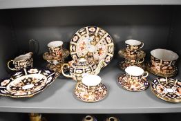 A selection of early 20th century Royal Crown Derby in the Imari palette, to include tea pot, sugar,