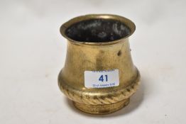 An Ankhora or ritual holy water pot of squat form in bronze or bronze effect metal, with rope like