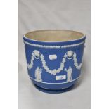 A late 19th/ early 20th century Wedgwood blue Jasper ware planter, impressed with Wedgwood P and 6