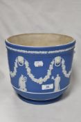 A late 19th/ early 20th century Wedgwood blue Jasper ware planter, impressed with Wedgwood P and 6