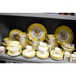 A large collection of 20th century yellow and white table wear having Chelsea style bird design