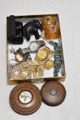A miscellany of items to included two vintage treen boxes and an elephant, scarf ring, watches and