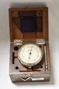 A vintage Elliot brothers, London, speed indicator in wooden box.