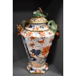 A large Masons Ironstone lidded urn or vase having floral design in the Imari palette with gilt