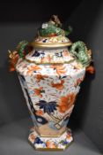 A large Masons Ironstone lidded urn or vase having floral design in the Imari palette with gilt