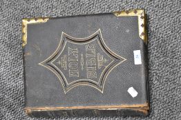 A late Victorian family bible with brass clasps, AF.