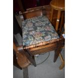 A Victorian mahogany piano stool