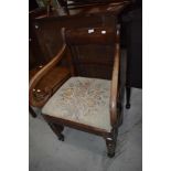 A 19th Century mahogany scroll arm carver chair