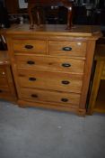 A modern golden oak chest of two over three drawers, dimensions approx. W95 D45 H100cm