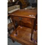 A modern hardwood occasional table in the period style, width approx. 56cm