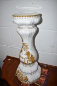 A ceramic jardiniere stand having painted decoration in the Continental style , no marks, height