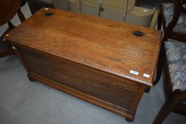 An early to mid 20th Century oak blanket box