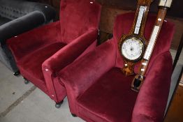 A pair of early 20th Century easy chairs
