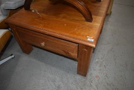 A modern pine square coffee table, one drawer (other missing)
