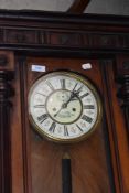 A 19th Century mahogany cased Vienna style wall clock, having enamelled dial named for J Bowley of