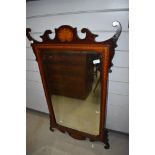 An Edwardian Chippendale style wall mirror