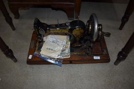 A vintage Jones hand crank sewing machine