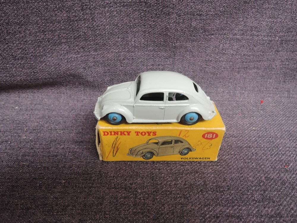 A Dinky diecast, 181 Volkswagen, Grey with light blue hubs, in original correct spot box