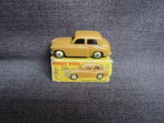 A Dinky diecast, 154 Hillman Minx Saloon, Fawn in original box, missing both end flaps