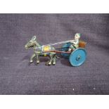 A Gama DRGM Germany tinplate and clockwork Donkey with Cart and Clown