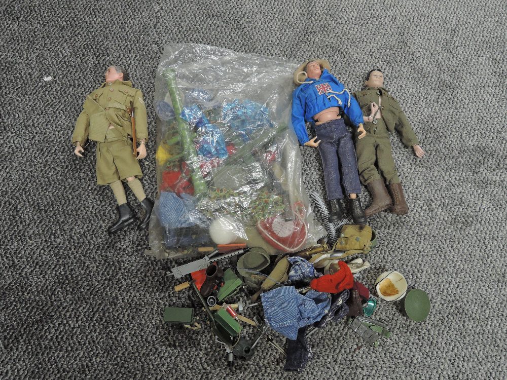 Two original 1964 Palitoy Hasbro Action Men both being fully clothed, a later Redbox Hong Kong