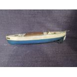 A 1930's Sutcliffe clockwork and tinplate 16' Meteor Speed Boat in blue and c ream